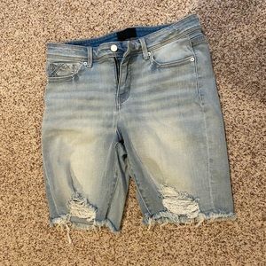 Light blue distressed midi high waisted buckle black shorts